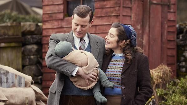 'All Creatures Great and Small' returns with a fifth season. Credit: Helen William, Playground Entertainment, and Masterpiece James holds a baby while Helen stands next to him and smiles